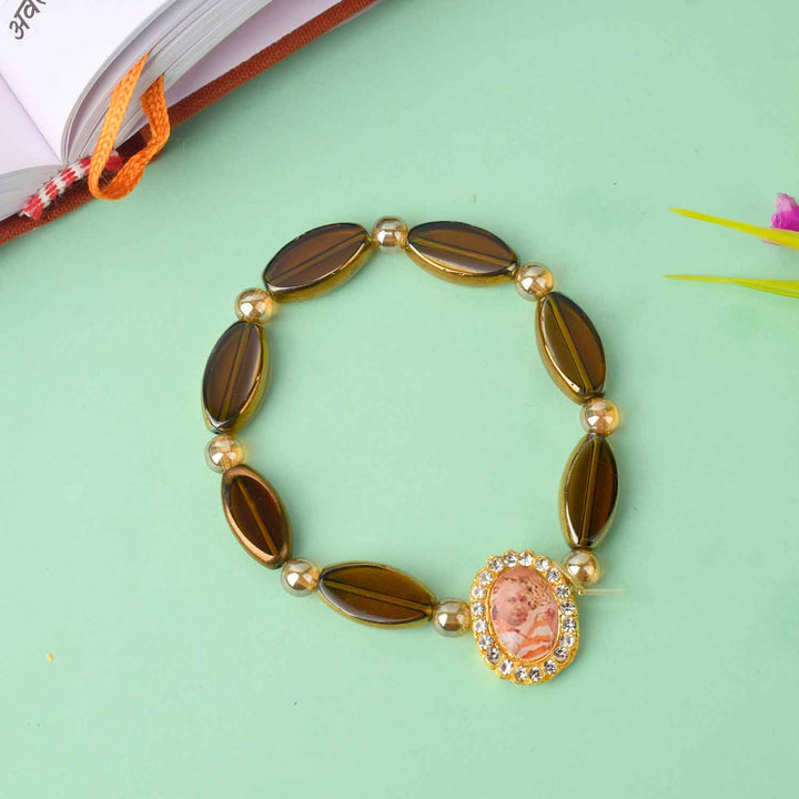 Guruji Swaroop Bracelet with translucent oval shaped beads in brown and black β ideal for spiritual daily wear and gifting. Indiaβs Largest Pooja Accessories Brand β www.satvikstore.in