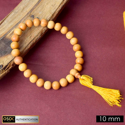 Handcrafted 10mm 27 Bead White Chandan Money Mala made from pure sandalwood beads for meditation, mantra chanting, and attracting wealth and positive energy.Indiaβs Premium Jap Mala Store - www.satvikstore.in