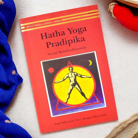 Front cover of the "Hatha Yoga Pradipika: Light on Hatha Yoga" paperback edition, a classical guide on traditional Hatha Yoga practices. Indiaβs Largest Pooja Accessories Brand β www.satvikstore.in