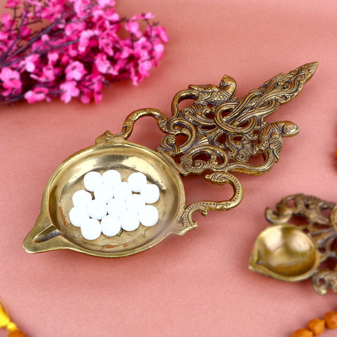 Designer Brass Pooja Aarti Spoon Large, a finely crafted large brass spoon used for performing aarti during pooja ceremonies and spiritual rituals. 
Indiaβs Largest Pooja Accessories Brand β www.satvikstore.in