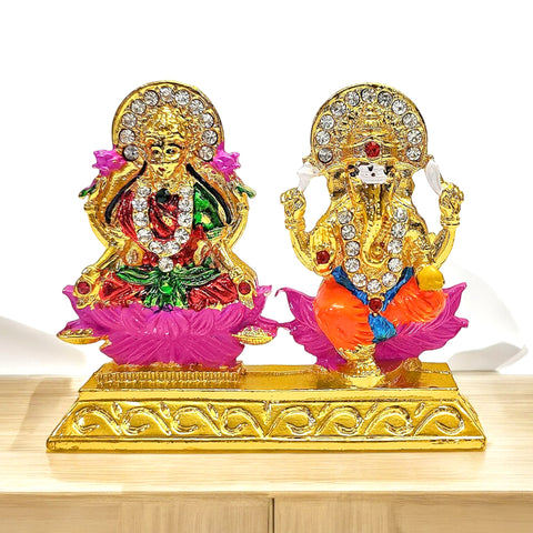 elegant Laxmi Ganesh idol made of metal, combining the revered deities Lakshmi and Ganesha. This intricately designed statue is a symbol of wealth, prosperity, and spiritual blessings, perfect for placement in your home or temple. Indiaβs Largest Pooja Accessories Brand β www.satvikstore.in