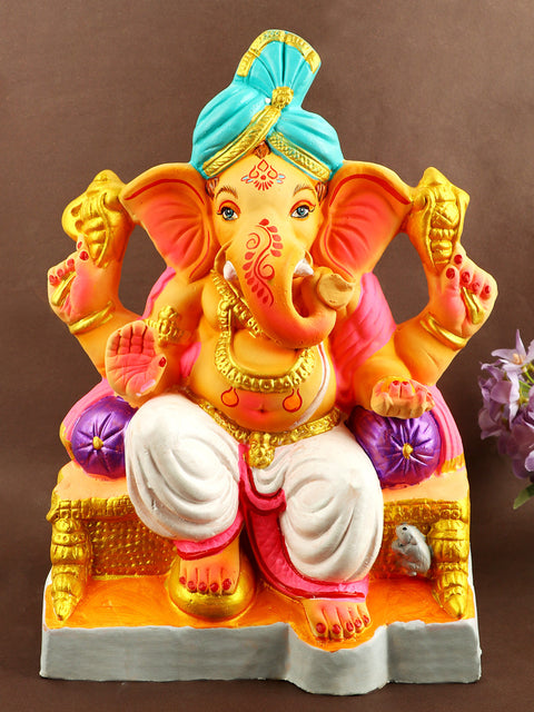 Graceful 13.3-inch Manomay eco-friendly Ganesha idol seated in regal Raja pose with vibrant detailing and a majestic crown, perfect for eco-conscious Ganesh Chaturthi celebrations. Indiaβs Largest Pooja Accessories Brand β www.satvikstore.in