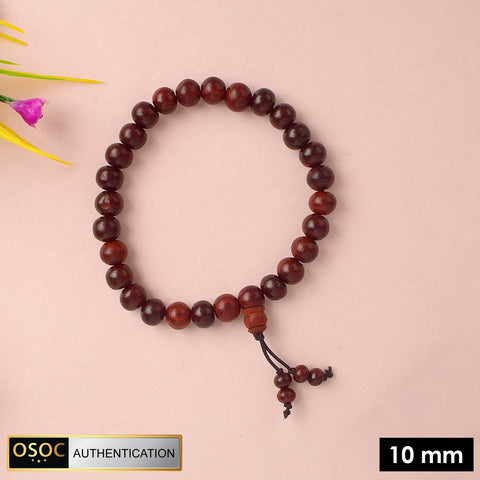 Beautiful handcrafted Red Chandan Bracelet made from pure red sandalwood beads, designed for enhancing spiritual balance, inner strength, and daily protection during meditation and pooja. Indiaβs Largest Pooja Accessories Brand - www.satvikstore.in