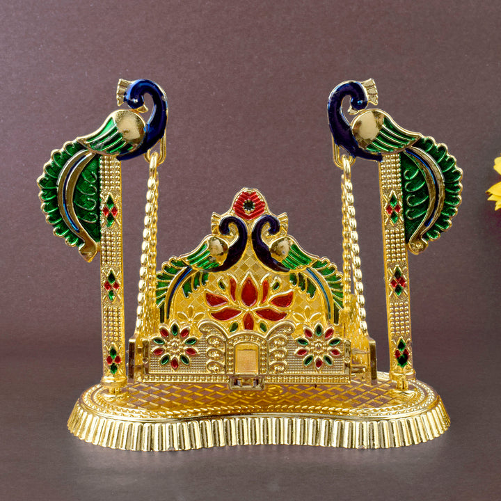 Peacock-themed graceful Laddu Gopal Jhula with intricate design, ideal for Bal Gopal idol placement during pooja or Janmashtami festivities. Indiaβs Largest Pooja Accessories Brand β www.satvikstore.in