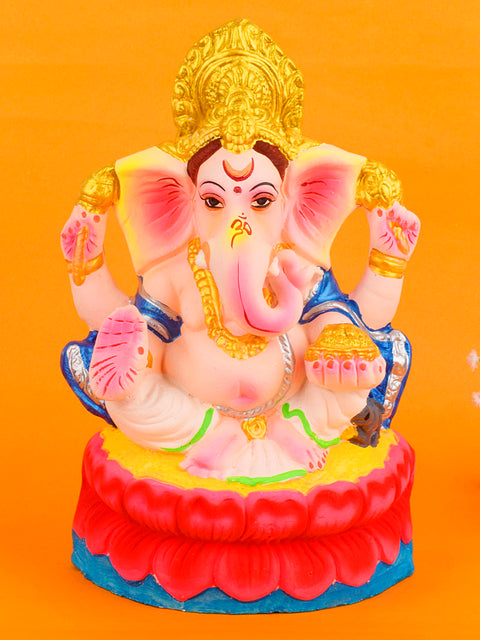 Graceful 10.6-inch Pitambara Ganesha idol crafted from eco-friendly clay, adorned with a vibrant yellow dhoti and serene expression. Indiaβs Largest Pooja Accessories Brand β www.satvikstore.in