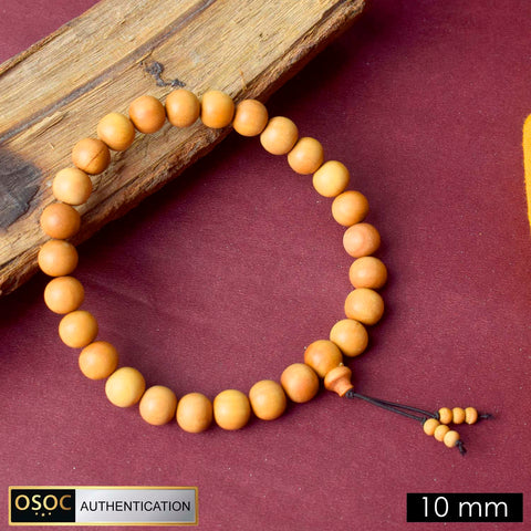 Pure 10mm Elastic 27 Bead White Chandan Money Mala made from authentic sandalwood for wealth attraction, spiritual protection, and daily meditation.Indiaβs Premium Jap Mala Store - www.satvikstore.in