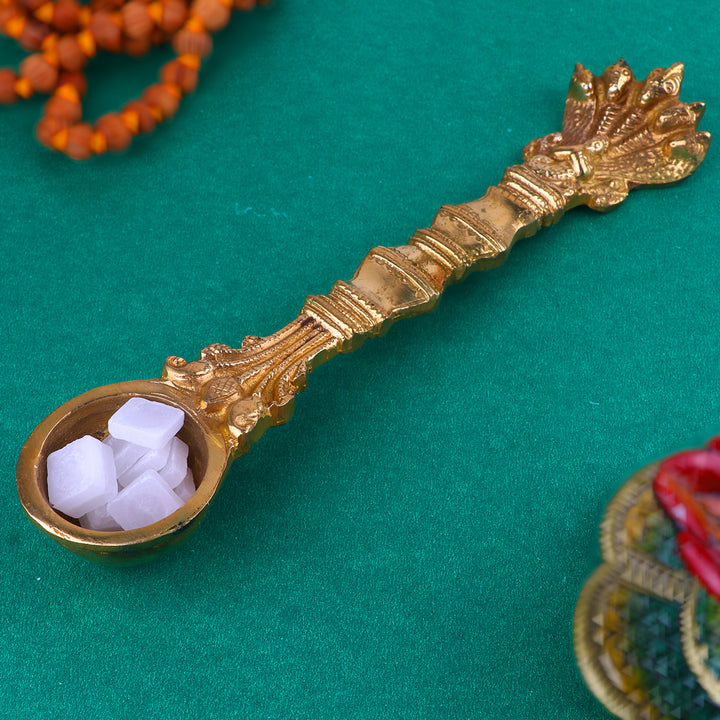 Pure Brass Pooja Aarti Sheshnaag Spoon, a finely crafted brass spoon featuring the design of Sheshnaag, used for performing aarti during pooja and spiritual rituals. 
India’s Largest Pooja Accessories Brand – www.satvikstore.in