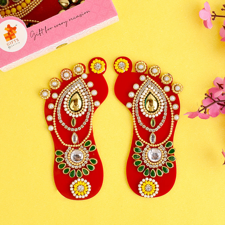 Religious Laxmi Charan Paduka Prosperity's Footprints Sticker featuring symbolic Goddess Lakshmi footprints, ideal for temple entrances, pooja rooms, and festive home decor. 
India’s Largest Pooja Accessories Brand – www.satvikstore.in