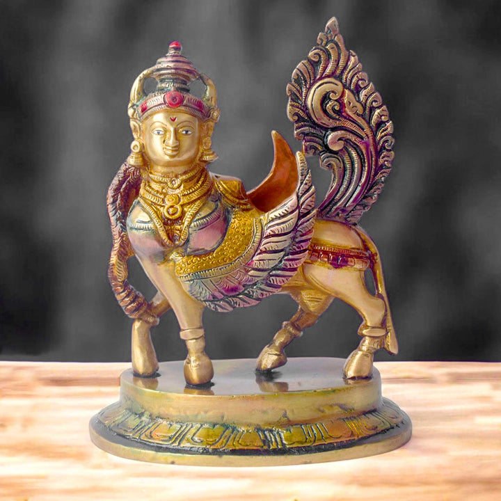 The "6.5 Inch Brass Kamdhenu Cow Statue" is a beautifully crafted representation of Kamdhenu, the sacred wish-fulfilling cow in Hindu mythology. Standing at 6.5 inches tall, this intricately designed statue is made from high-quality brass, showcasing exquisite detailing that highlights Kamdhenu's divine form, with a peaceful and nurturing presence.