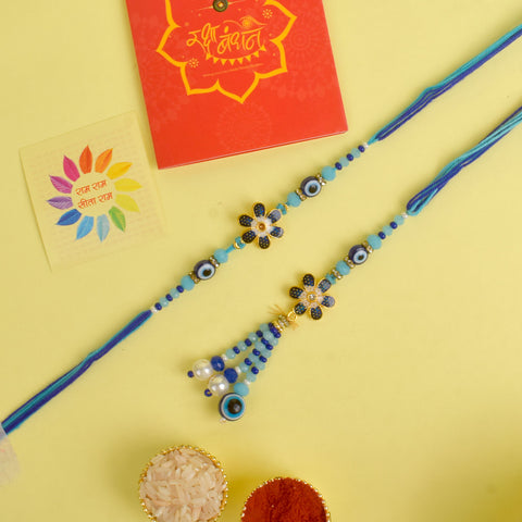 Designer Couple Rakhi Set for Bhaiya and Bhabhi with Roli Chawal and Ram Sita Stickers β Raksha Bandhan Gift Combo. Indiaβs Largest Brass Idols Brand - www.satvikstore.in