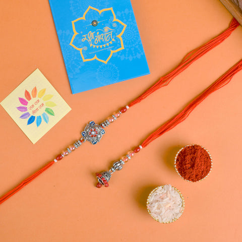 Designer Couple Rakhi Set for Bhaiya and Bhabhi with Roli Chawal and Ram Sita Stickers β Raksha Bandhan Gift Combo. Indiaβs Largest Brass Idols Brand - www.satvikstore.in