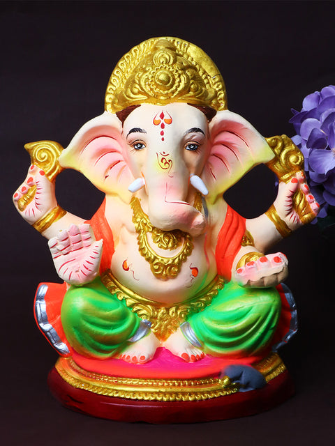 9-inch Skandapurvaja eco-friendly Ganesha idol handcrafted from shadu mati, seated in a calm posture with elegant detailing, ideal for visarjan. Indiaβs Largest Pooja Accessories Brand β www.satvikstore.in