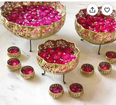 Striking Gold Lotus Diya Urli Set with 8 Votives β Elegant decorative urli set in a lotus design with gold finish, featuring 8 votive holders for festive and spiritual dΓ©cor. Indiaβs Largest Pooja Accessories Brand β www.satvikstore.in