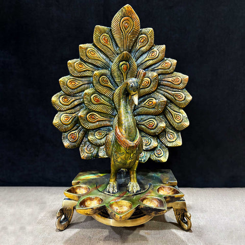 14 Inch Stylish Brass Peacock Panch Diya featuring an elegant peacock design with five diya holders, beautifully crafted for traditional rituals, home dΓ©cor, and festive celebrations. Indiaβs Largest Pooja Accessories Brand β www.satvikstore.in