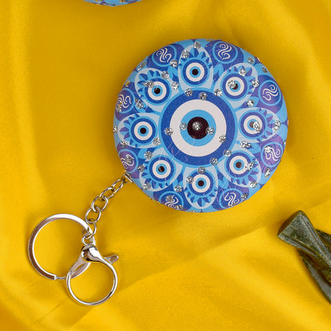 Stylish Round Evil Eye Keychain with Foldable Mirror β Practical and protective charm for everyday use. Indiaβs Largest Pooja Accessories Brand β www.satvikstore.in