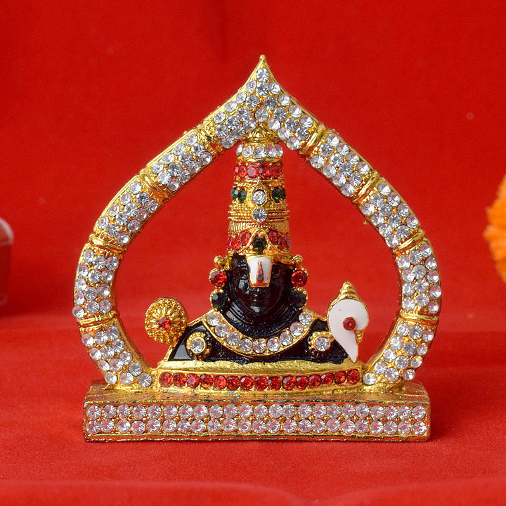 Beautifully decorated metal Tirupati Balaji face idol adorned with colorful stones and intricate detailing, perfect for home or car dashboard decor. India’s Largest Pooja Accessories Brand – www.satvikstore.in