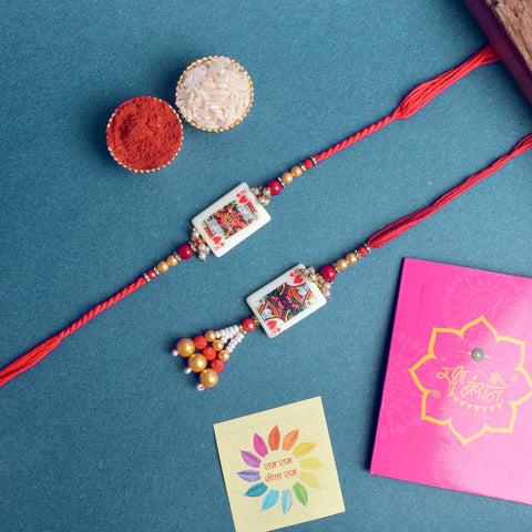 Designer Couple Rakhi Set for Bhaiya and Bhabhi with Roli Chawal and Ram Sita Stickers β Raksha Bandhan Gift Combo. Indiaβs Largest Brass Idols Brand - www.satvikstore.in