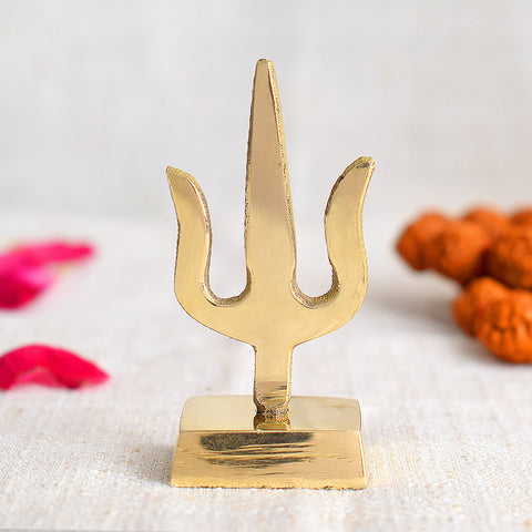 Elegant Trishul dashboard idol designed for cars, symbolizing divine power and protection, featuring fine craftsmanship to enhance spiritual aura and positivity while traveling. Indiaβs Largest Pooja Accessories Brand β www.satvikstore.in