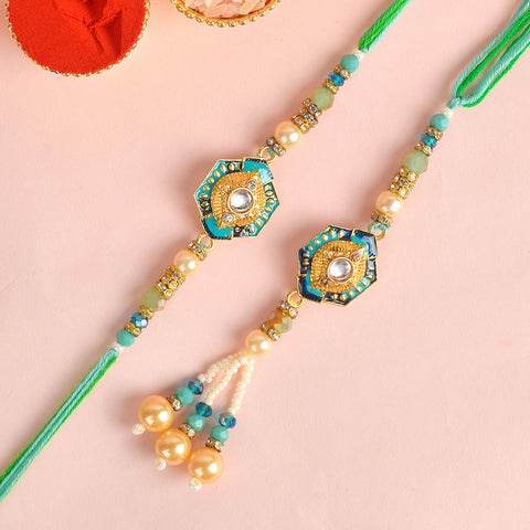 Designer Couple Rakhi Set for Bhaiya and Bhabhi with Roli Chawal and Ram Sita Stickers β Raksha Bandhan Gift Combo. Indiaβs Largest Brass Idols Brand - www.satvikstore.in