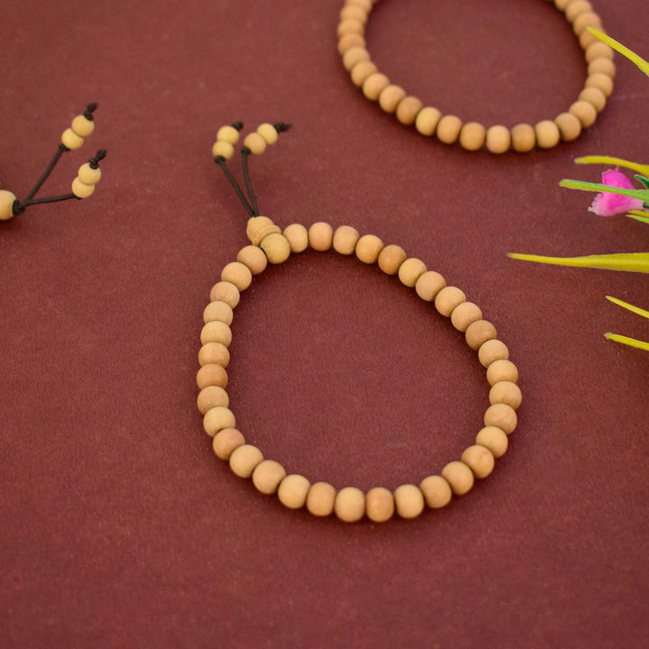 Elegant handcrafted White Chandan Bracelet made from pure white sandalwood beads, offering peace, emotional calm, and spiritual clarity—perfect for meditation, pooja, or daily wear. India’s Largest Pooja Accessories Brand - www.satvikstore.in