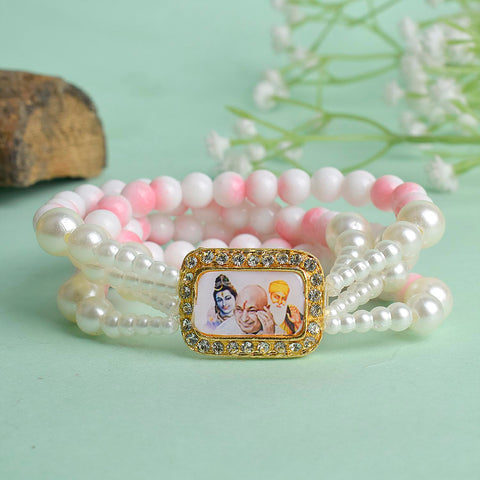 White & Pink Marble with White Pearl Four Layer Guruji Swaroop Bracelet featuring soft pink marble effect beads, elegant white beads, and luminous white pearls with Jai Guruji Swaroop β perfect for spiritual wear, festive gifting, and daily devotion. Indiaβs Largest Pooja Accessories Brand β www.satvikstore.in