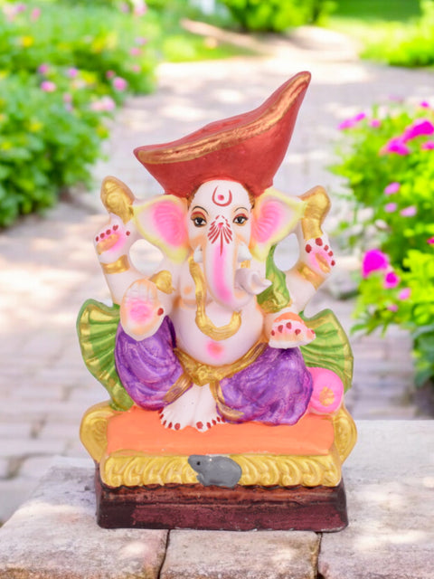 10.5-inch eco-friendly Ganpati idol in Padmasana pose, wearing traditional Mavala-style pagdi and vibrant festive attire. Indiaβs Largest Pooja Accessories Brand β www.satvikstore.in