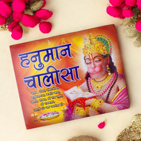 Front cover of the Hanuman Chalisa Book in Hindi featuring Lord Hanuman, with sacred verses, puja vidhi, and devotional illustrations. Indiaβs Largest Pooja Accessories Brand β www.satvikstore.in