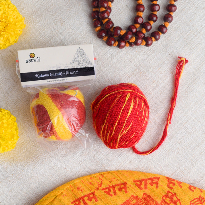 Pure Cotton Round Mauli Thread (Kalawa) is a traditional sacred thread used in Hindu rituals and religious ceremonies. It symbolizes protection, devotion, and blessings during poojas and festive occasions β Indiaβs Largest Pooja Accessories Brand β www.satvikstore.in