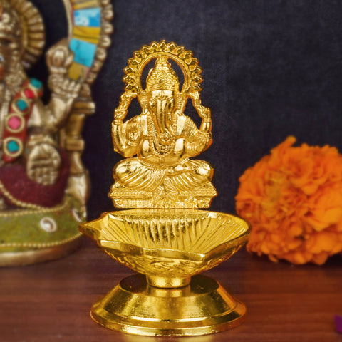 1 Pc Lord Ganesha Metal Diya β A beautifully crafted metal diya featuring the divine image of Lord Ganesha, perfect for spiritual rituals and home decor. Indiaβs Largest Pooja Accessories Brand β www.satvikstore.in