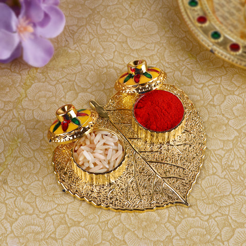 Beautiful Roli Akshat Small Pan Leaf Platter, crafted in a charming paan leaf shape, ideal for holding roli and akshat during pooja and tilak rituals. 
Indiaβs Largest Pooja Accessories Brand β www.satvikstore.in