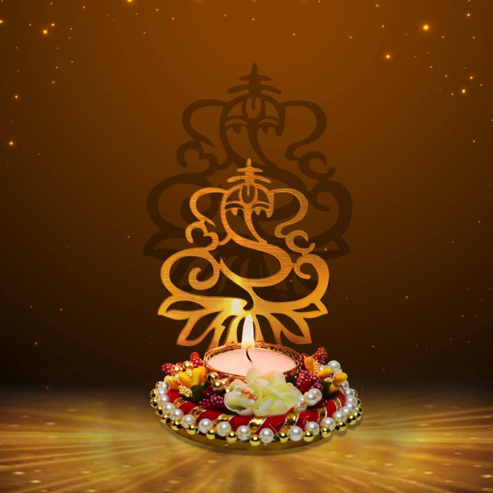 Beautiful Decorative Ganesh Shadow Diya crafted in metal, designed to cast a shadow of Lord Ganesha when lit, perfect for home décor, festive lighting, and spiritual ambiance during puja or Diwali. India’s Largest Pooja Accessories Brand – www.satvikstore.in