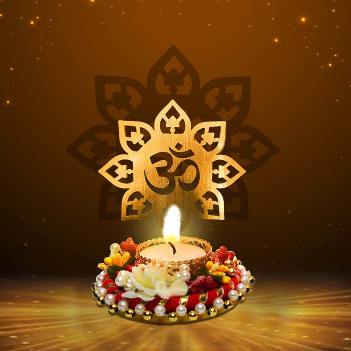 Beautiful Decorative OM Shadow Diya made of metal, casting a sacred 'OM' shadow when lit, ideal for spiritual ambiance, meditation, home temple décor, and festive lighting. India’s Largest Pooja Accessories Brand – www.satvikstore.in