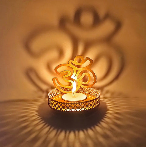 Handcrafted OM Shadow Diya, an intricately designed lamp showcasing the sacred OM symbol. When lit, it casts a divine shadow, perfect for spiritual rituals, meditation, or adding a touch of elegance to your home decor. Indiaβs Largest Pooja Accessories Brand β www.satvikstore.in