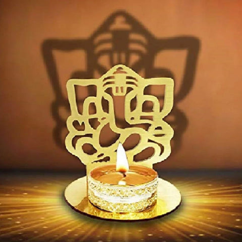 Lord Ganesha Shadow Diya, an intricately designed metal lamp featuring Lord Ganesha's image, casting a beautiful shadow when lit. Perfect for home decor, puja, and spiritual settings. Indiaβs Largest Pooja Accessories Brand β www.satvikstore.in