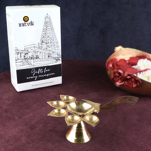 Panch Aarti Diya with Wooden Handle β Traditional five-wick aarti diya with a wooden handle, designed for pooja ceremonies and spiritual practices. Indiaβs Largest Pooja Accessories Brand β www.satvikstore.in