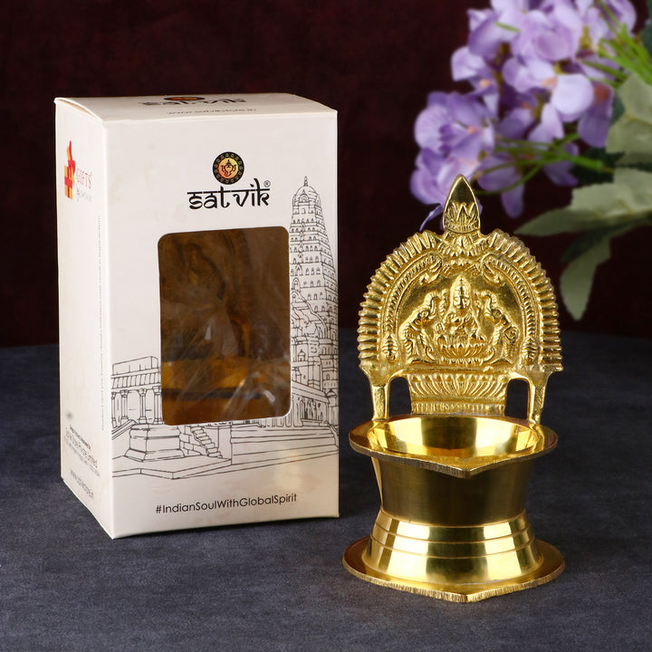 Brass Kamakshi Amman Diya (Medium) β Pure brass traditional oil lamp with the idol of Goddess Kamakshi, ideal for temple rituals and festive worship. Brass Kamakshi Amman Diya (Medium) β Pure brass traditional oil lamp with the idol of Goddess Kamakshi, ideal for temple rituals and festive worship.