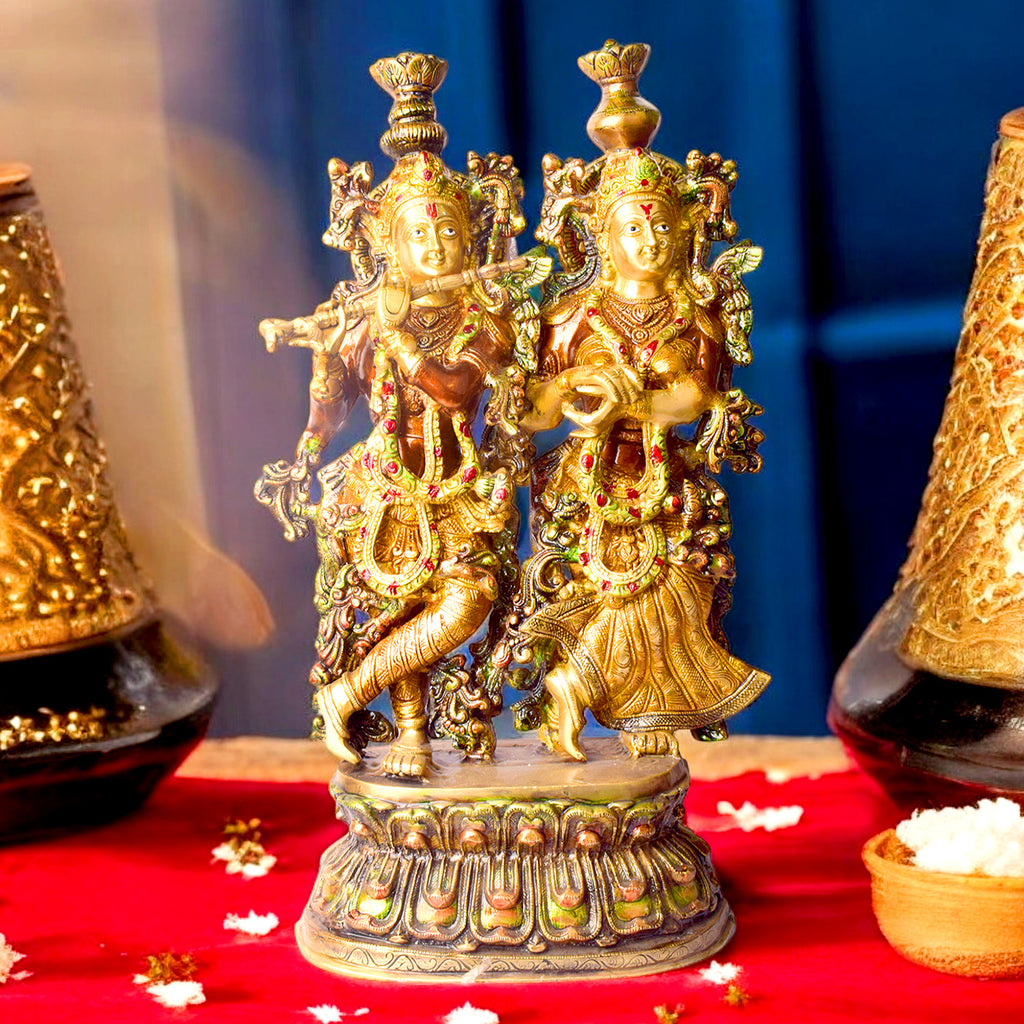  This Stunning Radha Krishna Brass Idol beautifully captures the divine love and grace of Radha and Krishna. Crafted from high-quality brass with intricate detailing, it exudes elegance and spiritual charm. 