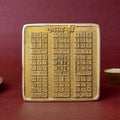 Asht Dhatu Navgrah Yantra with sacred engravings of nine planetary symbols, designed for balancing astrological energies and removing graha doshas in home or office. India’s Largest Pooja Accessories Brand - www.satvikstore.in


