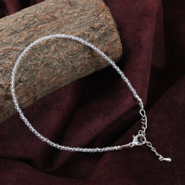 Clear crystal healing stone anklet for energy clarity and balance. India’s Largest Puja Accessories Brand- www.satvikstore.in
