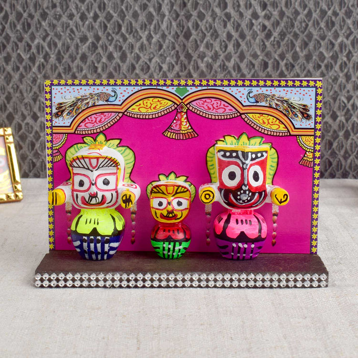 Handcrafted wooden Lord Jagannath idol with traditional detailing, ideal for devotion, travel blessings, and spiritual decor in home or vehicle. India’s Largest Pooja Accessories Brand - www.satvikstore.in
