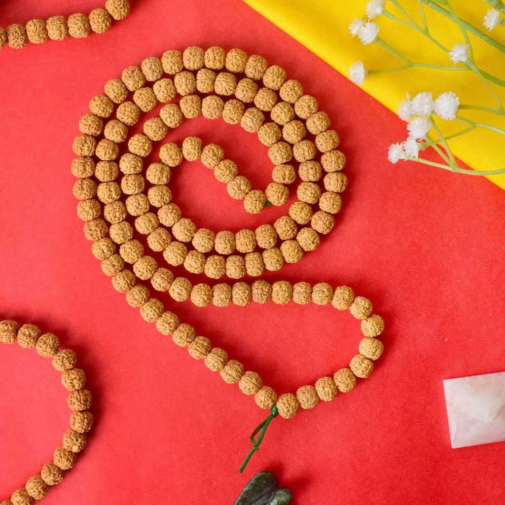 Semi Pathariya Rudraksha Mala with natural brown beads for meditation and spiritual chanting. India’s Premium Rudraksha Jap Mala Store- www.satvikstore.in
