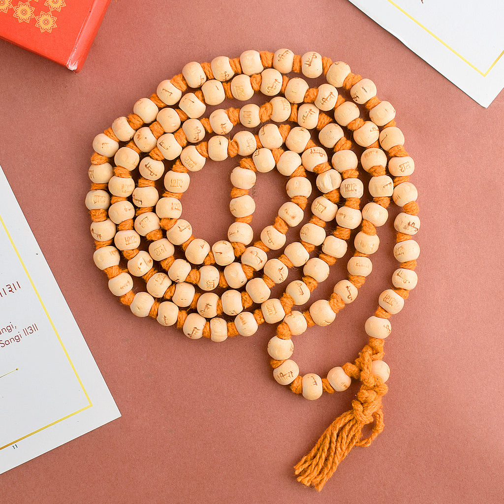 Ram Sita White Wooden Jaap Mala, featuring smooth white wooden beads strung together for meditation and prayer. The mala, with its tassel, is designed for chanting mantras and connecting with the divine energy of Lord Ram and Sita. India’s Premium Jap Mala Store- www.satvikstore.in