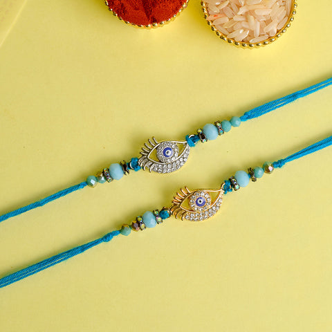 Designer evil eye Rakhi pair featuring turquoise beadwork. India’s Largest Pooja Accessories Brand - www.satvikstore.in