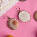 The Divine Gomti Chakra Pendant is a sacred and powerful spiritual charm, used in poojas and rituals to bring prosperity, good luck, and divine blessings. This pendant is believed to bring positive energy and remove obstacles – India’s Largest Pooja Accessories Brand – www.satvikstore.in