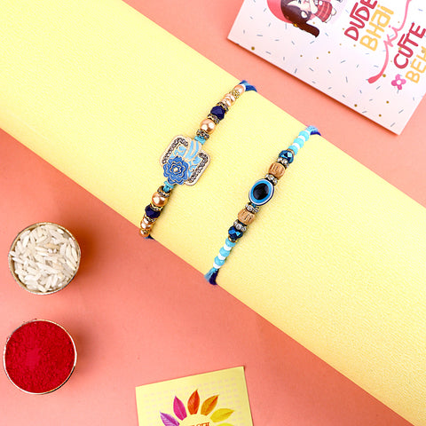 Elegant Rakhi pair with decorative beadwork for brothers. India’s Largest Pooja Accessories Brand – www.satvikstore.in
