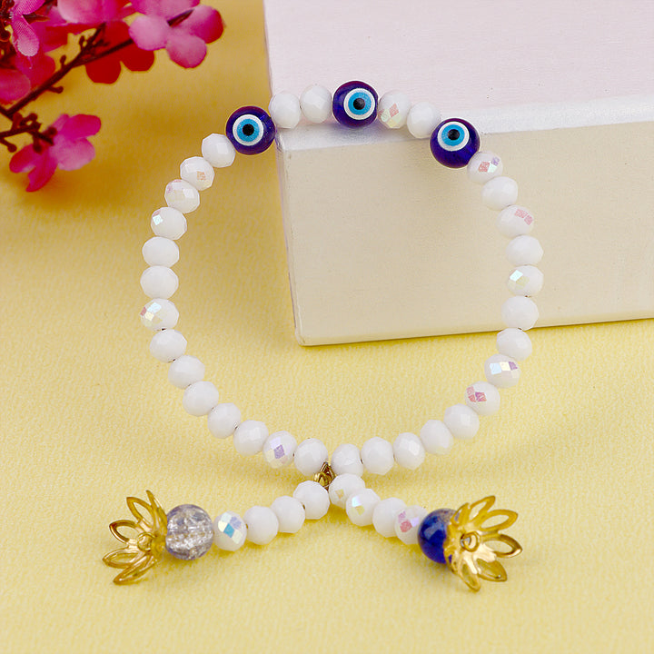 Evil Eye Lumba Rakhi with white crystal beads India’s Largest Pooja Accessories Brand – www.satvikstore.in

