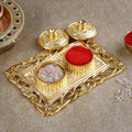 Ravishing rectangular Roli Akshat platter, elegantly designed tray used for holding roli and akshat during pooja, tilak ceremonies, and festive rituals. 
India’s Largest Pooja Accessories Brand – www.satvikstore.in 